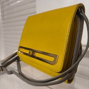 Vince Camuto Crossbody Bag. Yellow leather. Gray silk lining. Holds everything!
